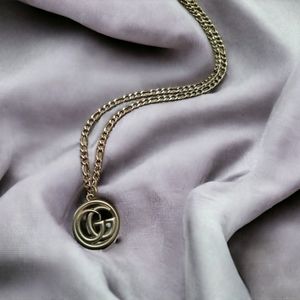 Pendant on a stainless steel chain-